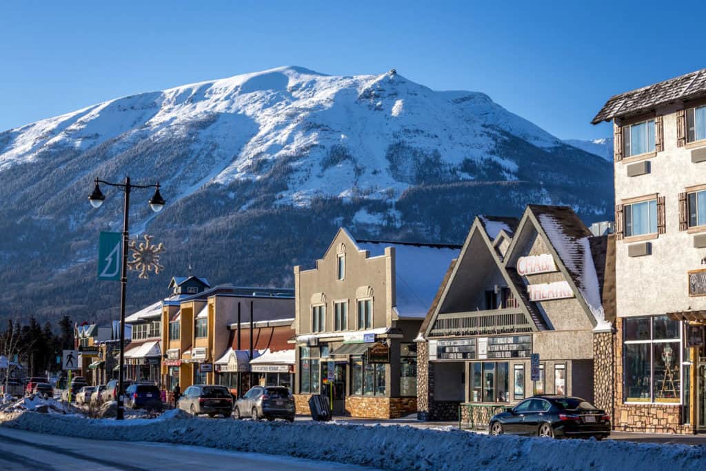 Jasper-Downtown-Jasper-Alberta Jasper townsite with mountain backdrop, shops, and streets in Jasper National Park