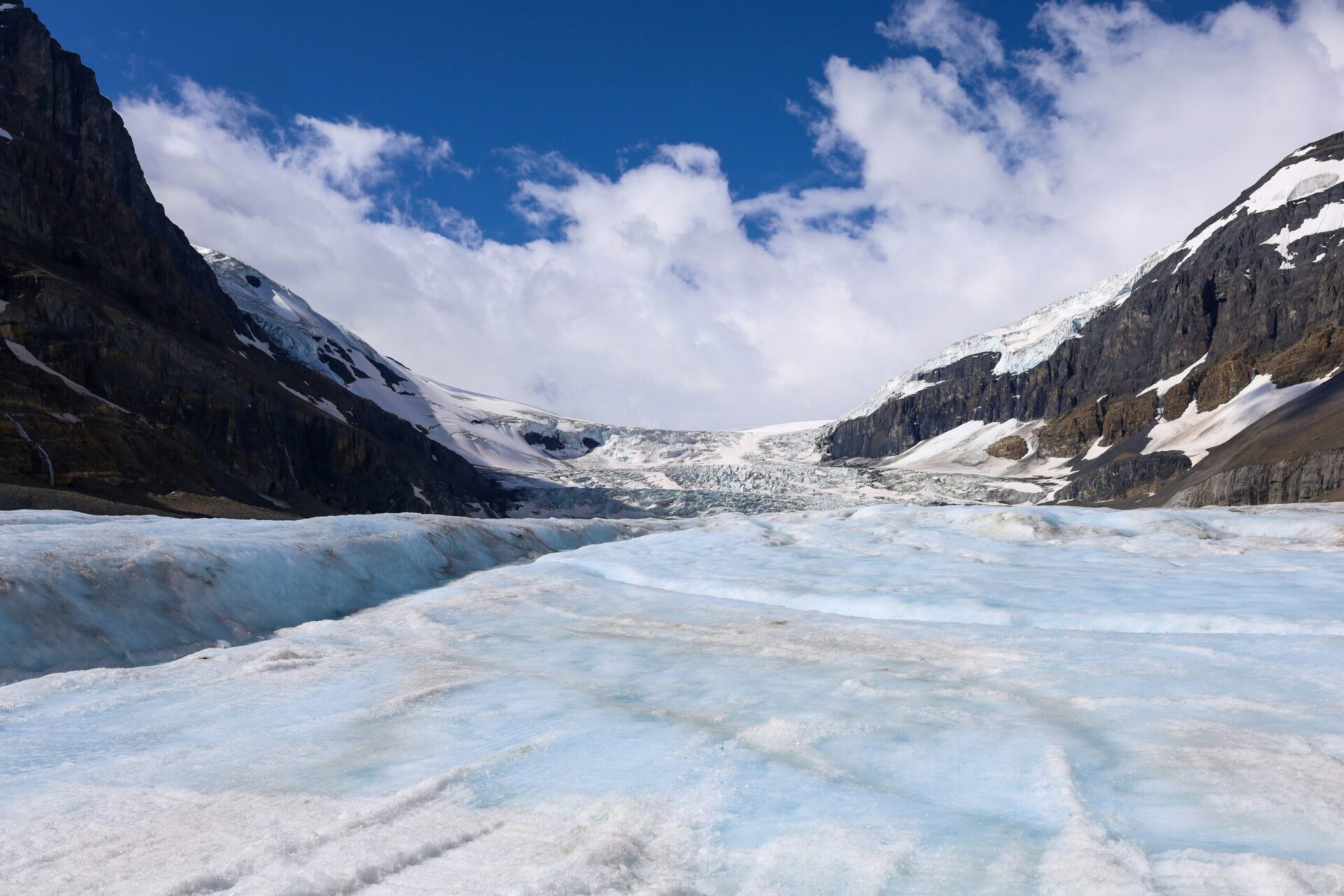 athabasca-glacier-columbia-icefield Visitors walking on the Columbia Icefield glacier during an ice walk experience near Jasper